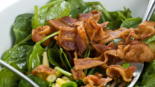 Aged Maple Balsamic Bacon Vinaigrette Over Wilted Baby Spinach