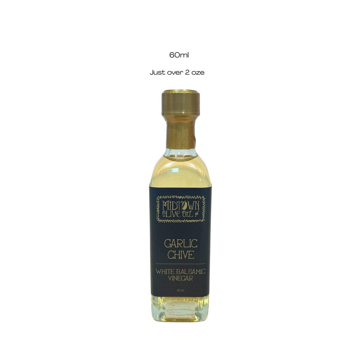 Bottle of Garlic Chive White Balsamic Vinegar with a gold cap on a white background