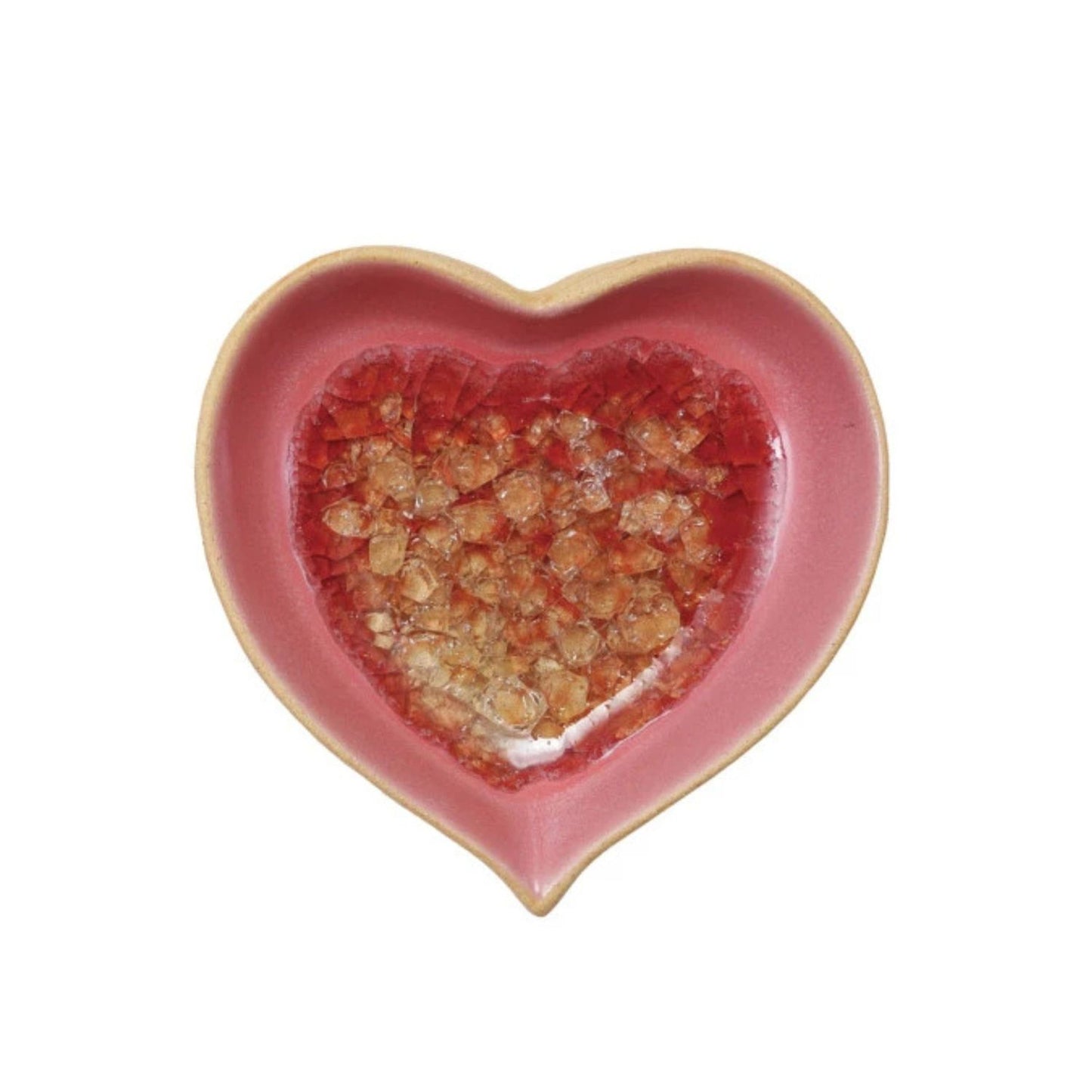 Heart-shaped pink ceramic dish with a textured red interior on a white background