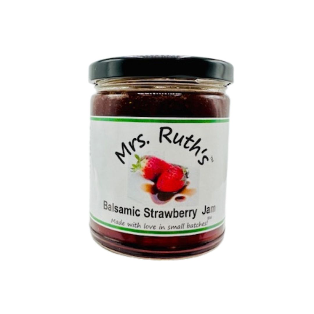 Jar of balsamic strawberry jam with 'Mrs. Ruth's label on a white background.