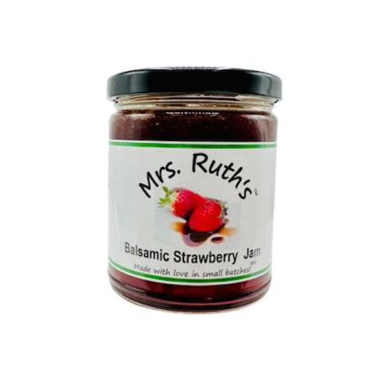 Jar of balsamic strawberry jam with 'Mrs. Ruth's label on a white background.