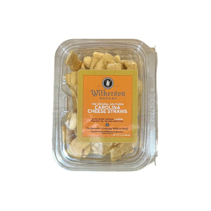 Packaged Carolina Cheese Straws with Wilkerson Cheeky branding on a white background.
